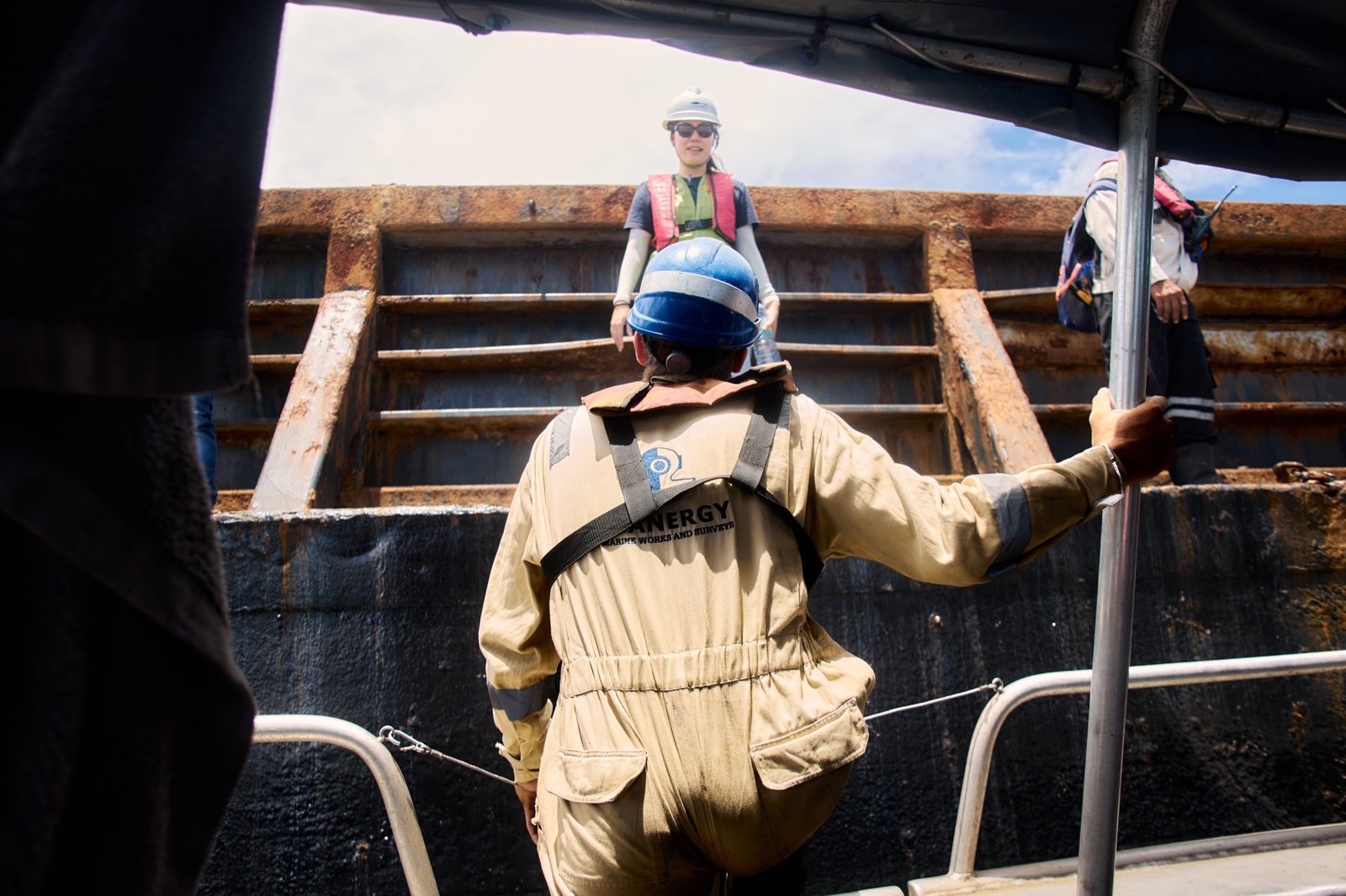 Seanergy team member on barge — a human approach to marine operations